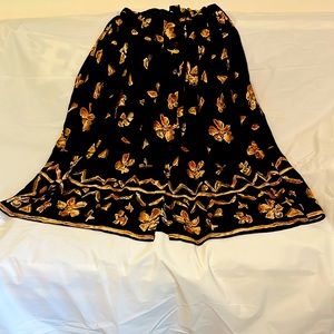 Together skirt, removable self belt, side pockets front button. Imported